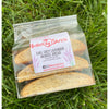 Earl grey lavender mandel bread, chewy like a cookie and shaped like biscotti, packaged and labeled Noshes by Sherri